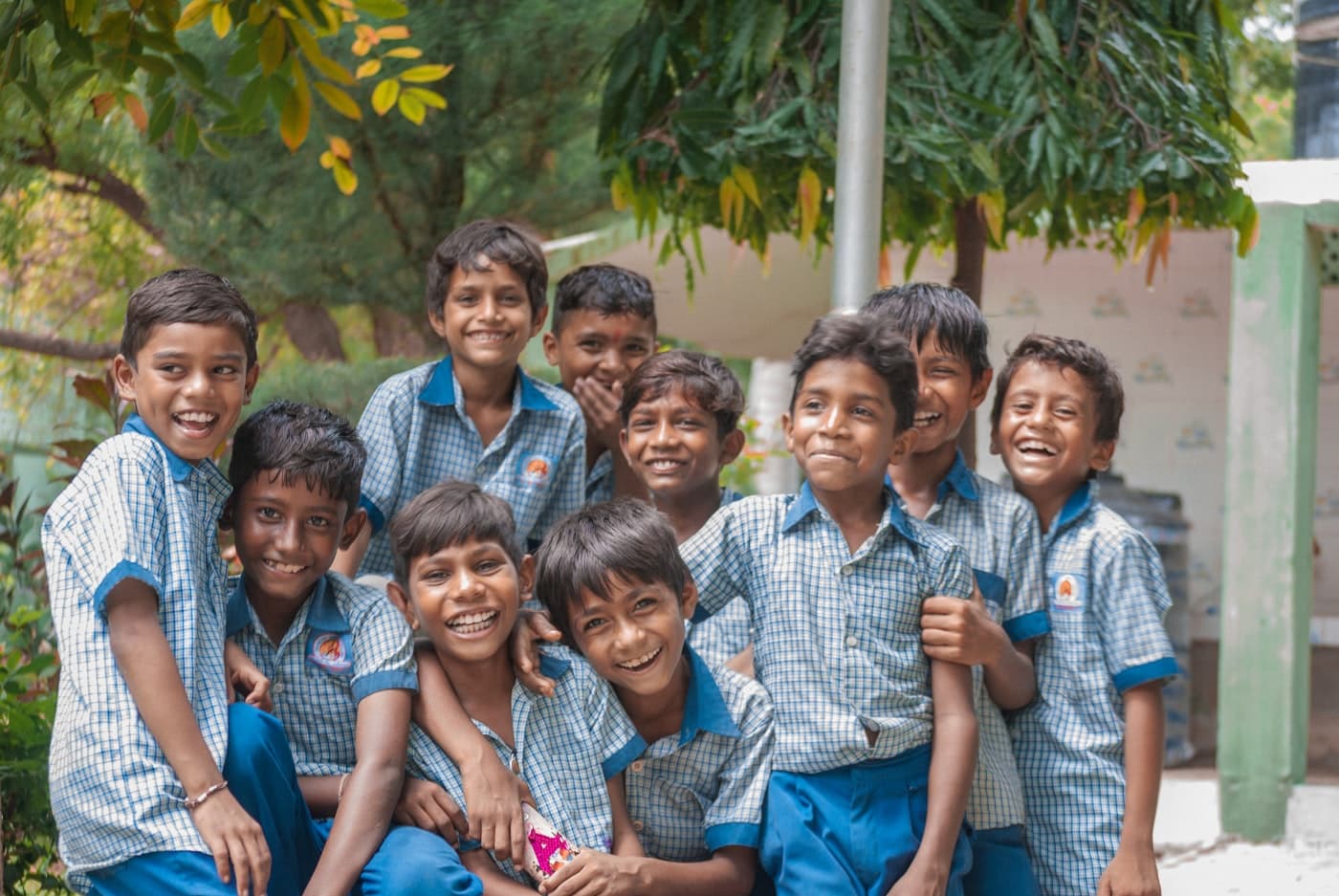 Group of school students in matching uniforms