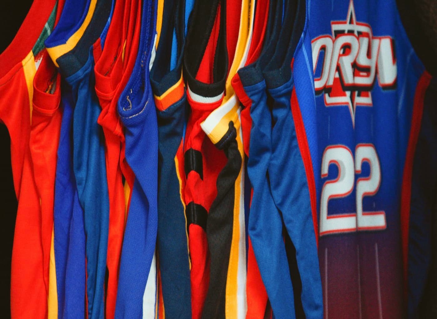 Rack of custom sports team jerseys
